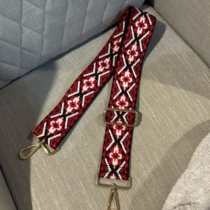 Red, black and white embroidered crossbody strap